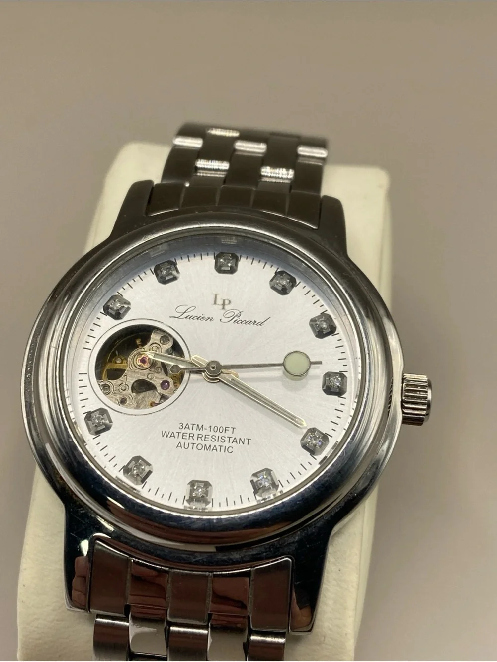 Lucien Piccard automatic stainless steel with diamond  stone very good condition